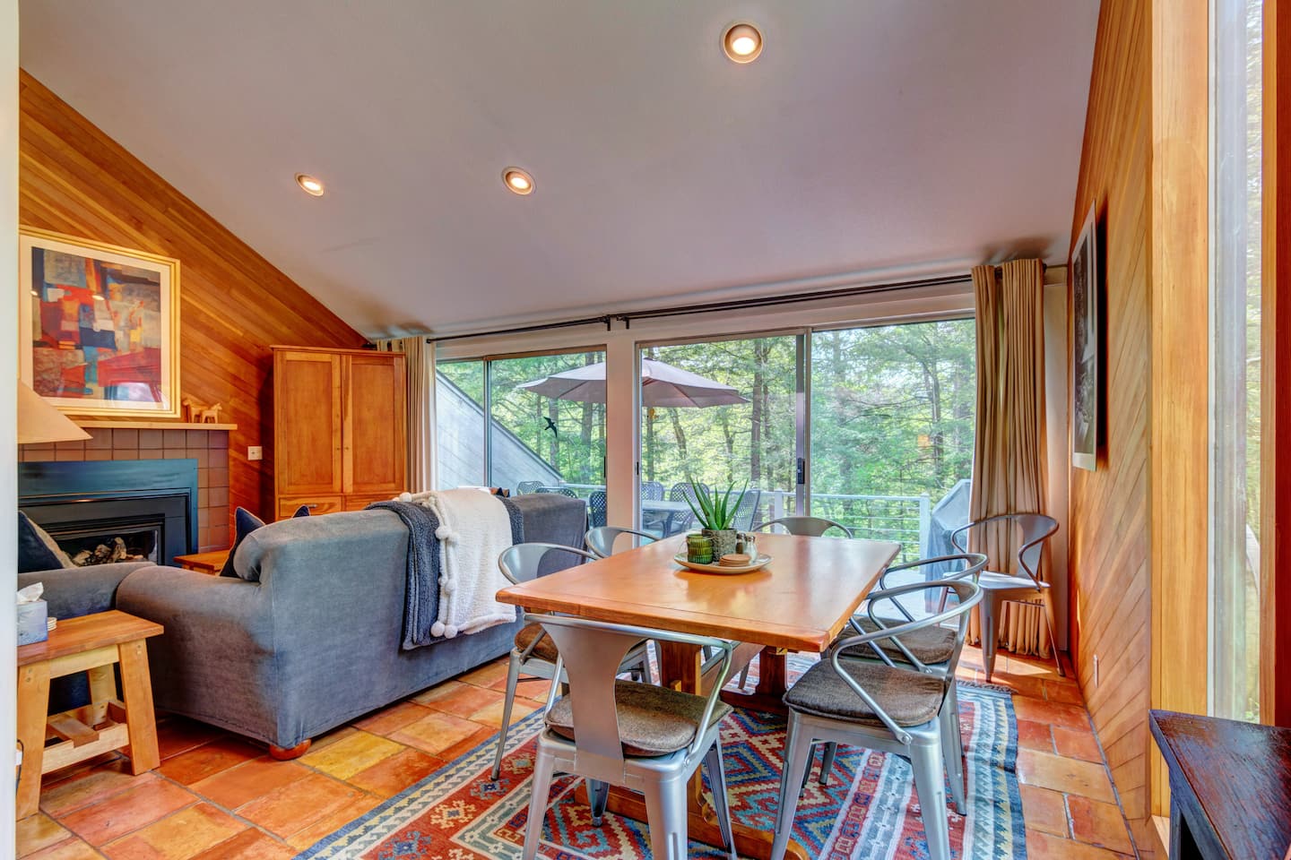 Open living and dining area in warm wood